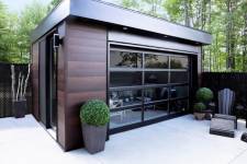 Modern style poolside garden house with California full view garage door, 12' x 7', Black aluminum profile, Clear glass