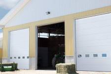 These agricultural garage doors are the G-5000 design in Ice White are 16’ x 18’ in size.