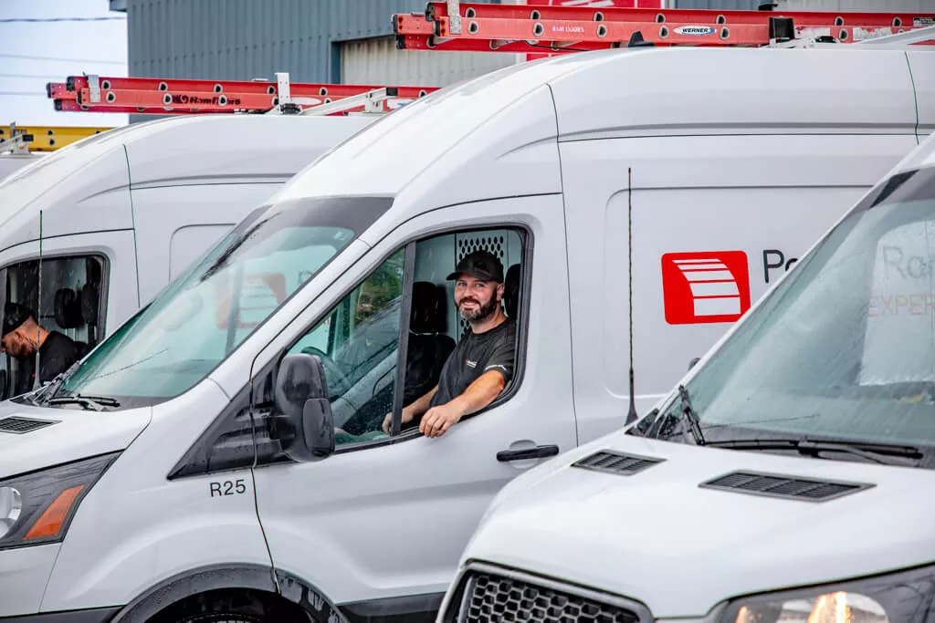Since 1996, one of our Portes Ram Doors expert team sitting in a service truck ready to come and repair or service your garage door